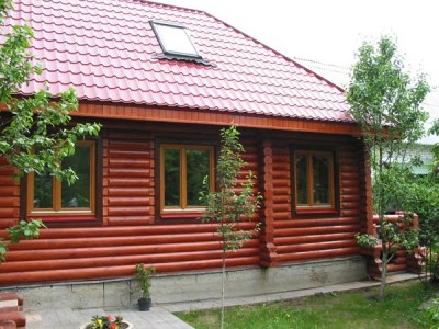 Как покрасить деревянный дом